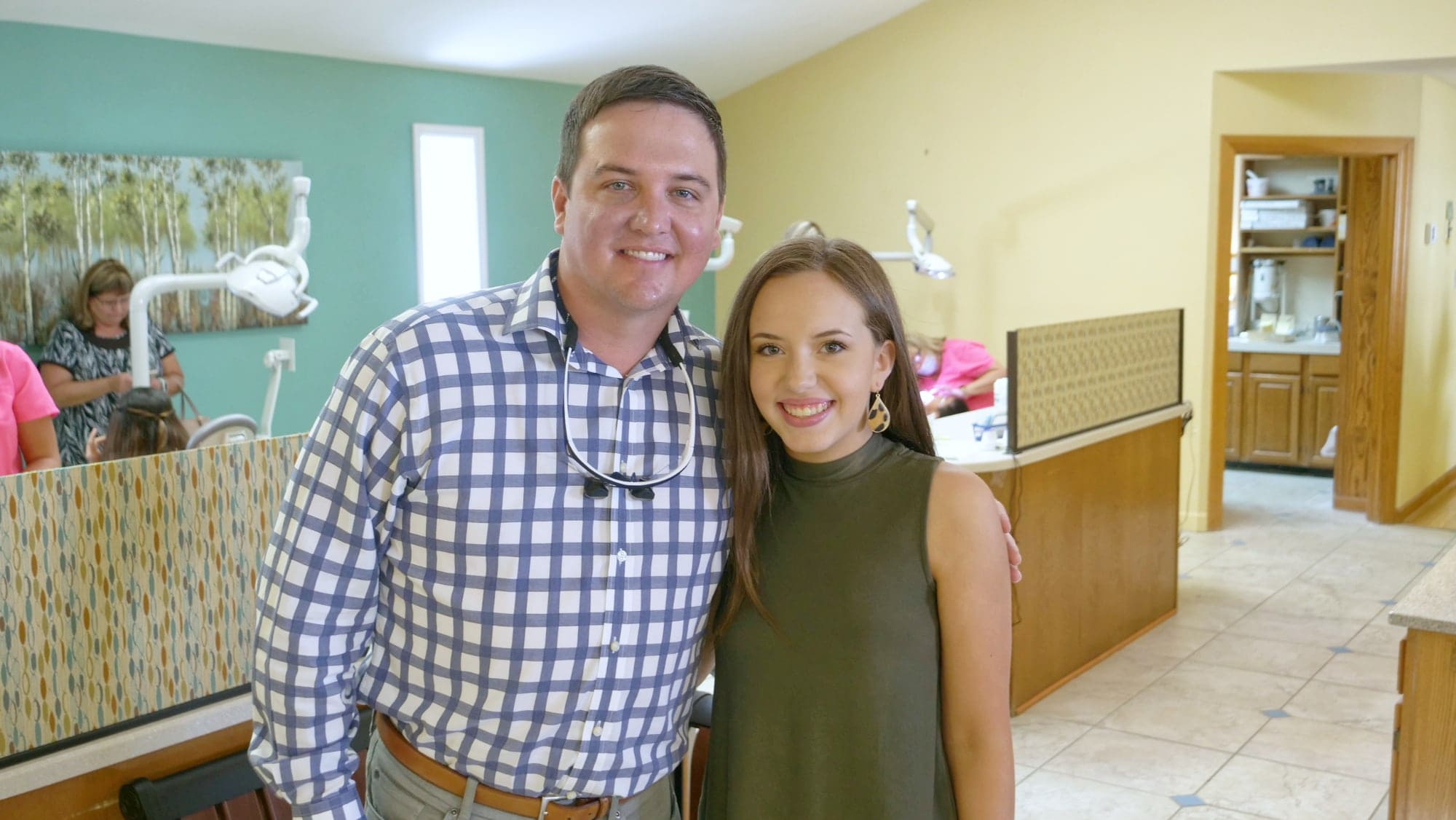 Dr. Westfall smiling with a patient